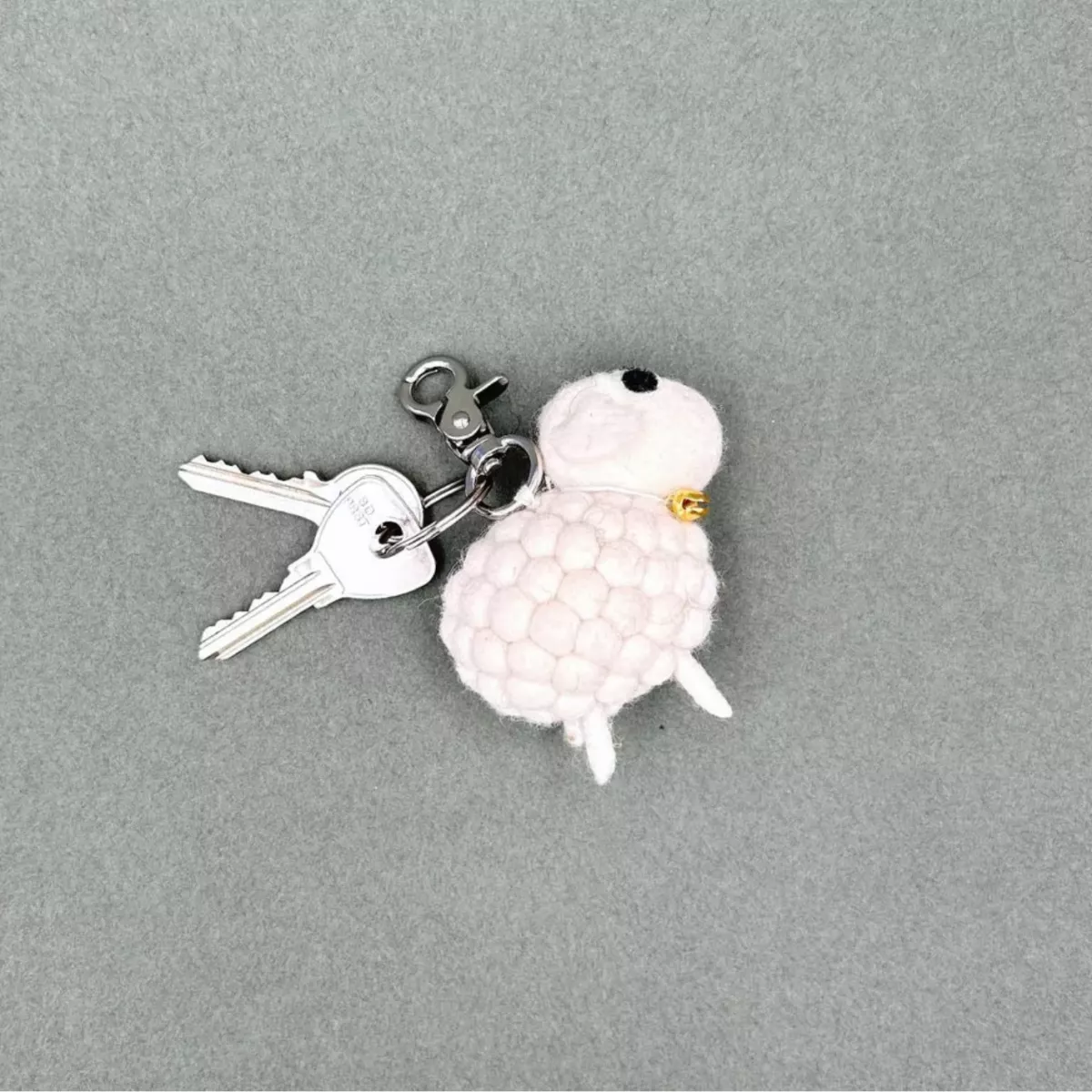 PORTE CLÉES MOUTON FEUTRINE