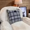 Coussin à carreaux en laine